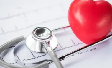 image of a stethoscope and a plastic heart