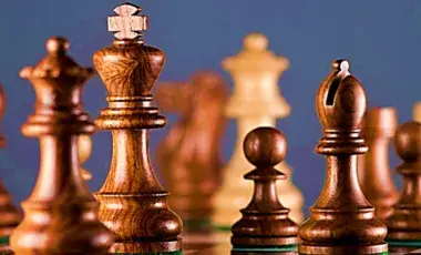 Chess board and chess pieces are in the picture