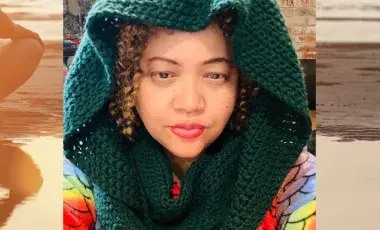 Dorothy Pincus in a green knitted scarf