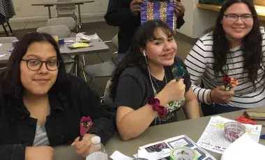 Teen Volunteers Making Duct Tape Flower Pens