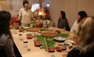 Group cooking class around table