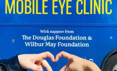 Image of the side signage of the Mobile Eye Clinic