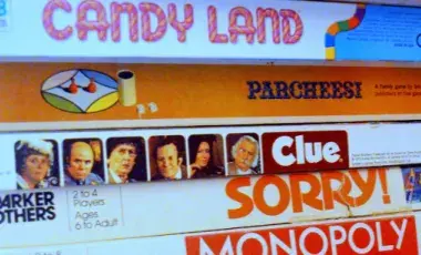 Children's Candy Land, Clue, Sorry, and Monopoly board games.
