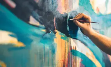 artist painting a canvas