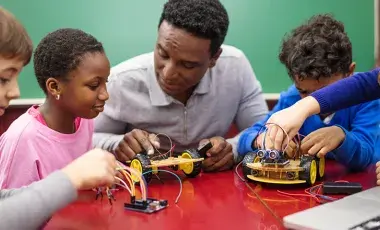 kids working on robotics