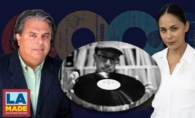 2 singers and a dj holding a record in the center