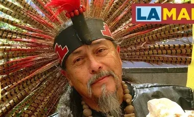Martin Espino wearing native head dress