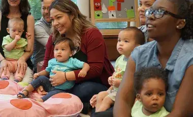 babys and caregivers in a storytime