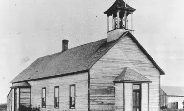 A school house in black and white.