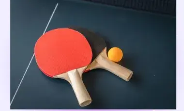 ping pong paddles on a table