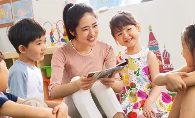 young woman volunteer with four students