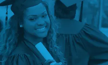 graduate in cap and gown