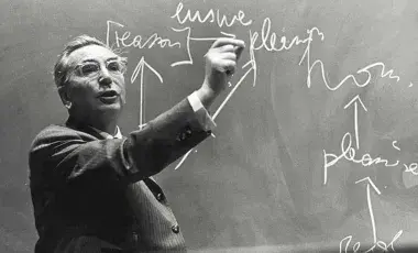 Viktor Frankl writing on a chalkboard