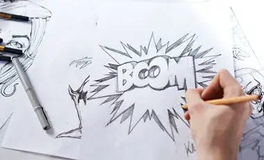 Person holding a pencil and drawing a comic bubble with the word boom in the middle.