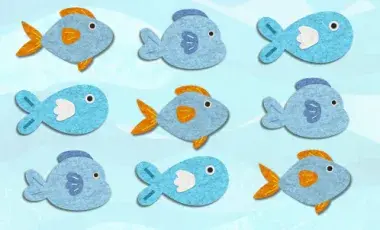 several blue fish, in three different shapes, swim in a repeating pattern