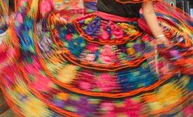 Dancer twirling in a folklorico dress