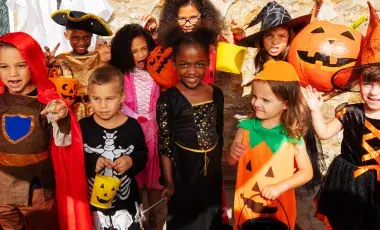 A group of children in Halloween costumes