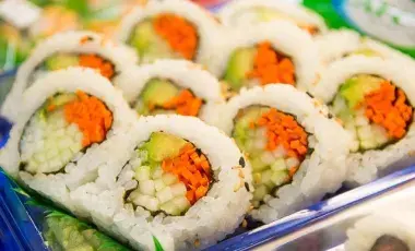 A color photo of cut cucumber sushi rolls, Image by kartynas from Pixabay