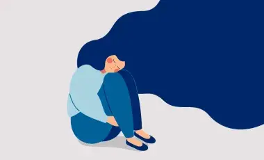 Illustration of a woman sitting on the floor with her knees tucked up towards her chest.