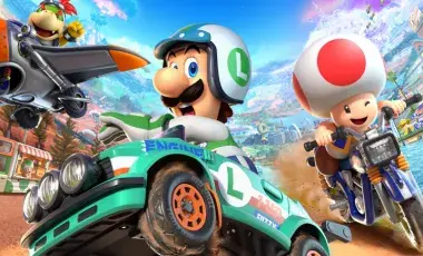 Luigi, Toad, and Baby Bowser racing in the Mario Kart game. 