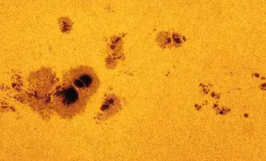 Sunspots on the surface of the Sun.