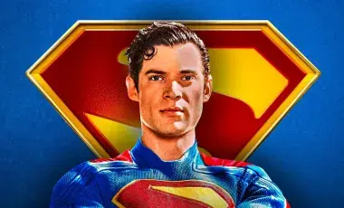 Illustration of Superman in front of his logo 