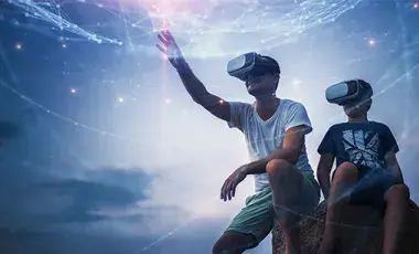 A man and a boy wear virtual reality headsets against a space background