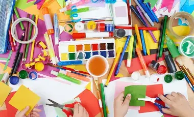 Table covered in art supplies.