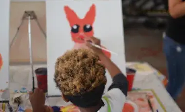 YOUNG PERSON PAINTING