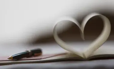pen and paper folder in heart shape