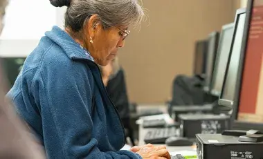 Senior woman using a computer