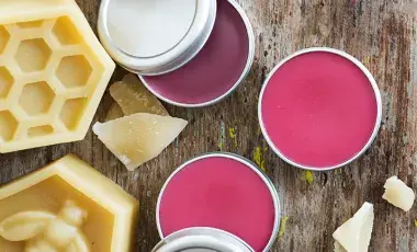soaps, metal containers, and lip balm inside the metal containers