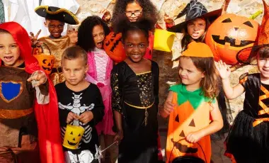 Children in costume at a Halloween party