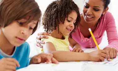 Tutor helping child