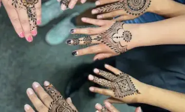 hands with henna designs