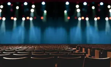 empty auditorium with lights and chairs