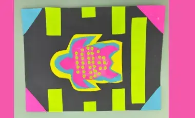 A neon pink turtle made out of construction paper surrounded by neon shapes on a black background.