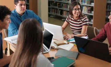 Students studying in a library.