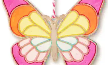 Butterfly suncatcher in shades of pink, yellow, and blue. 
