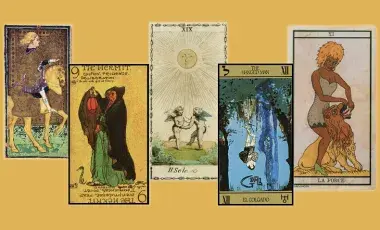 5 tarot cards on a golden background.