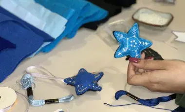 Handmade blue felt star ornaments