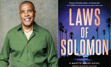 An African American man next to the cover for the book Laws of Solomon