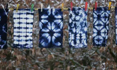 shibori samples hanging on a line