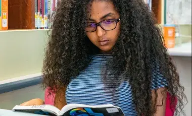 Teen girl reading
