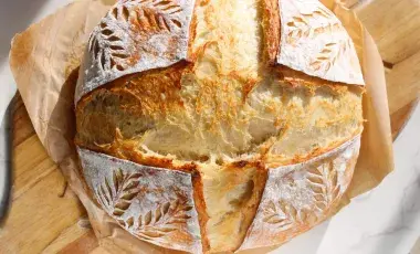 Overhead view of a loaf of sourdough bread