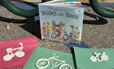 The book "Books on Bikes" and then three bikes made of clay.