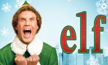 Man in elf costume with his mouth open. 