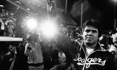 Dodger pitcher Fernando Valenzuela waves to his fans