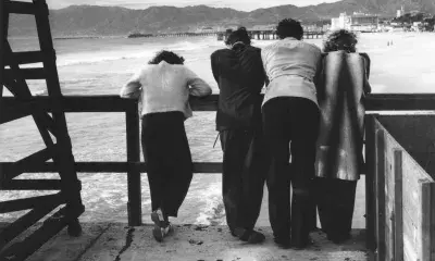 Visitors to the Ocean Park Pier are shown looking north towards the heart of Santa Monica and the Santa Monica Pier