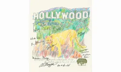 Drawing of mountain lion in front of Hollywood sign and autographs from Friends of Griffith Park, 2018